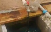 Reporte en Guadalajara por agua oscura saliendo de la llave de agua.