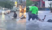 Rescatan a hombre de corriente en Monterrey