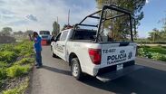 Patrulla de la Policía de Tlajomulco en el lugar donde el auto tuvo el accidente | Usi Toledo